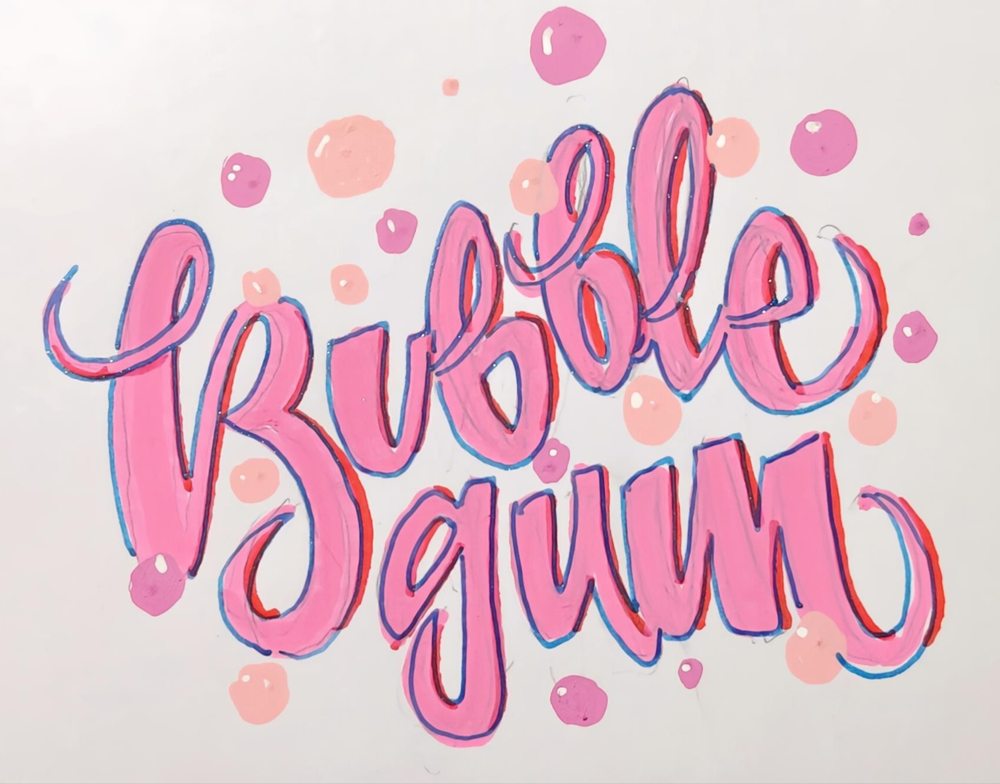 Pink Bubble gum lettering with blue shadows and pink circles